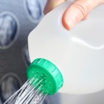 milk jug watering can, kids helping in the garden, cheep watering can, reuse milk jugs, 